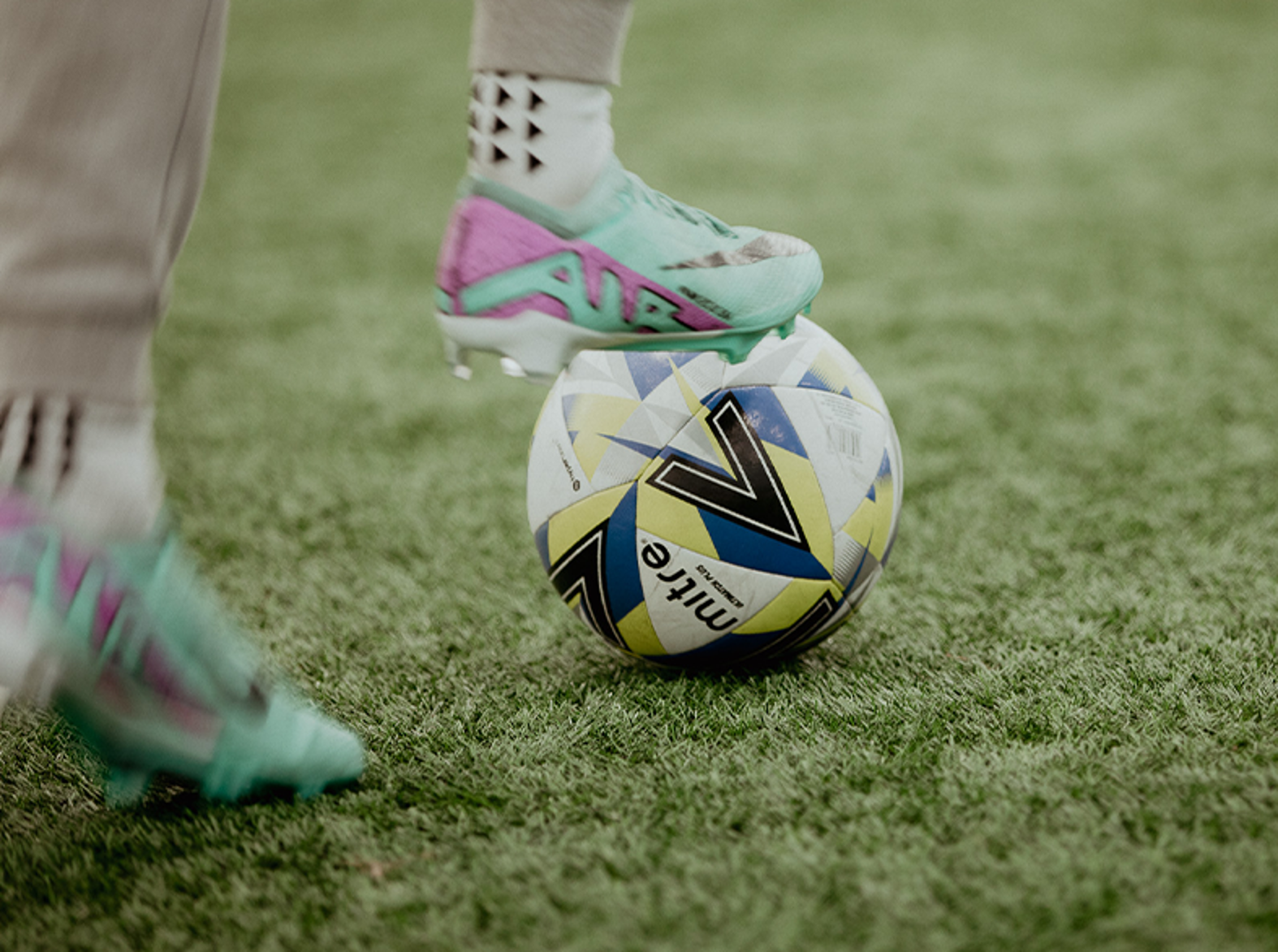 close up of foot on football