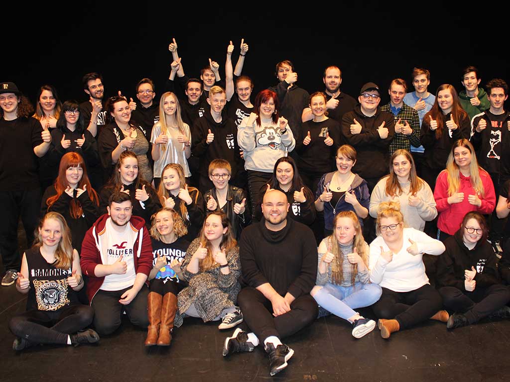 Andrew Gardiner pictured with the students during the workshop at Carnegie Hall, Dunfermline.