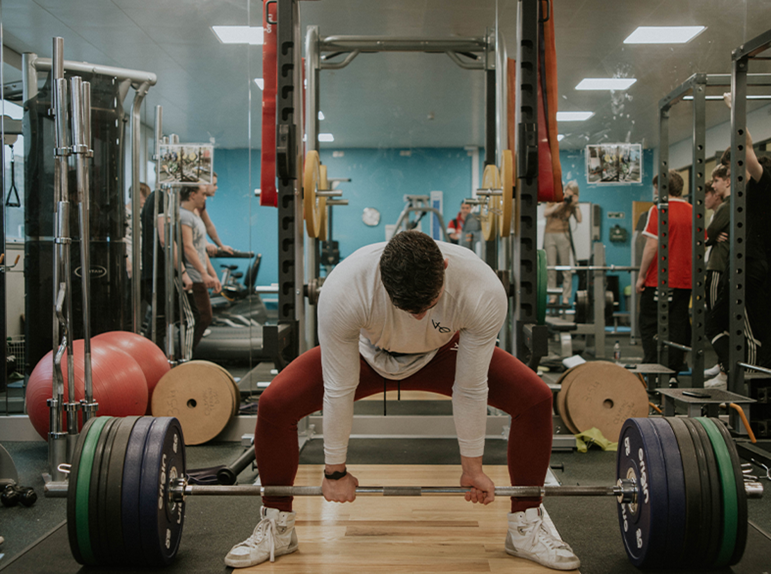 man deadlifting weight