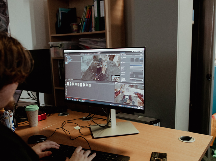 students working on computer