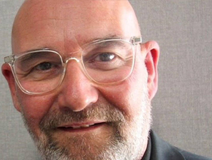 bill banks alumni smiling at camera