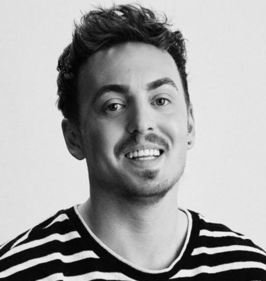 Headshot of man with striped t-shirt Headshot of man with striped t-shirt