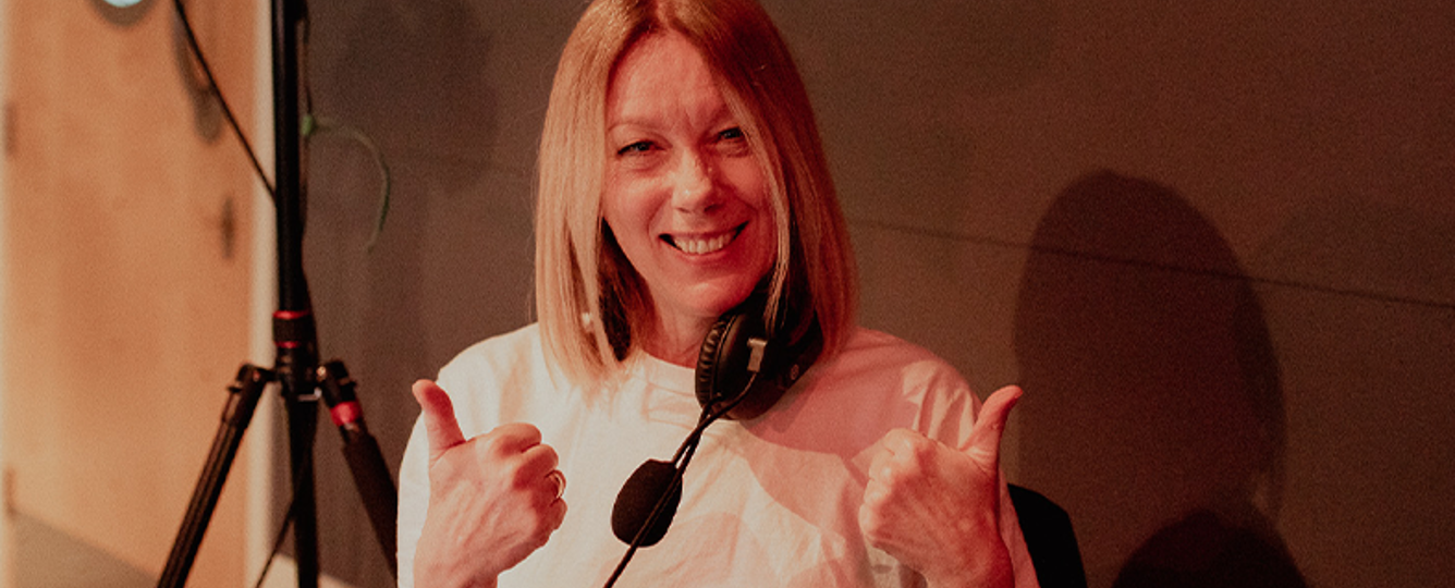 female student in recording studio