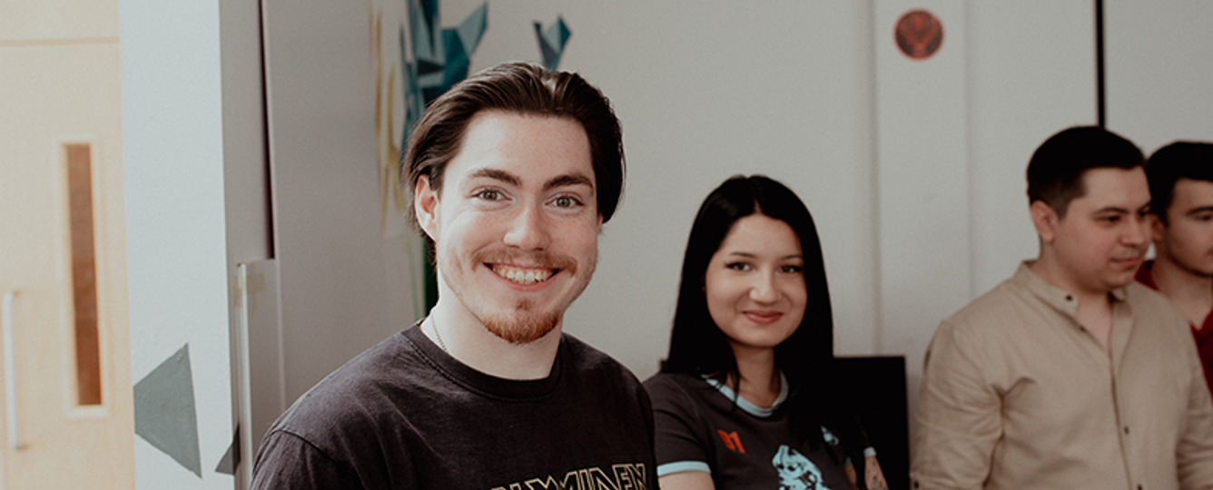 gaming students smiling at camera