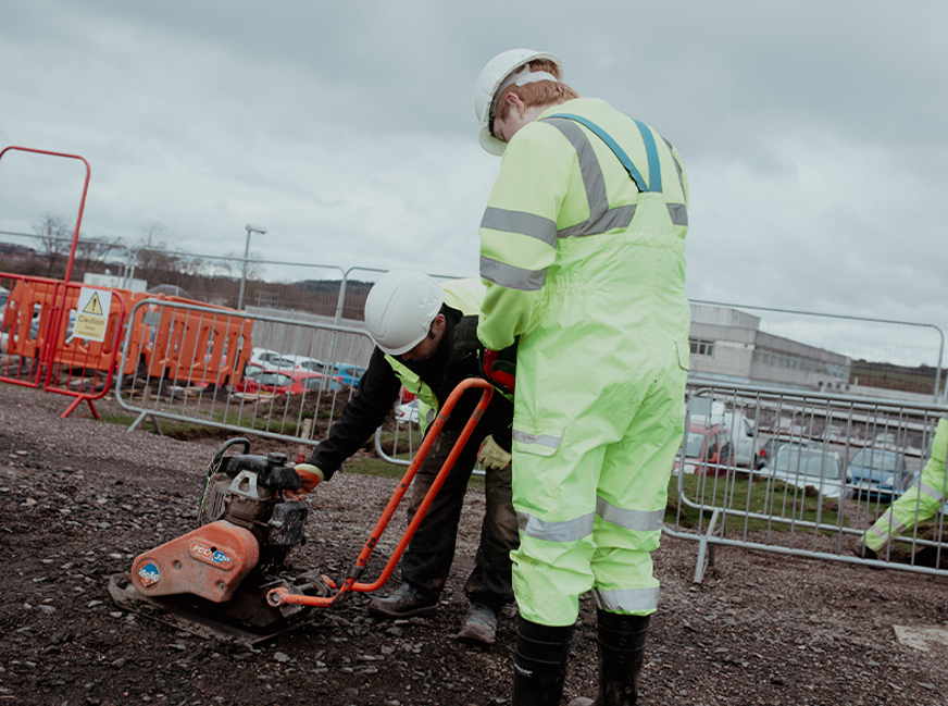 students using equipment outside