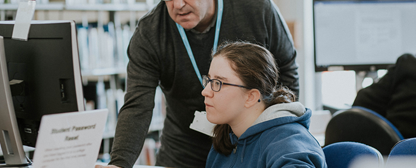 lecturer with student