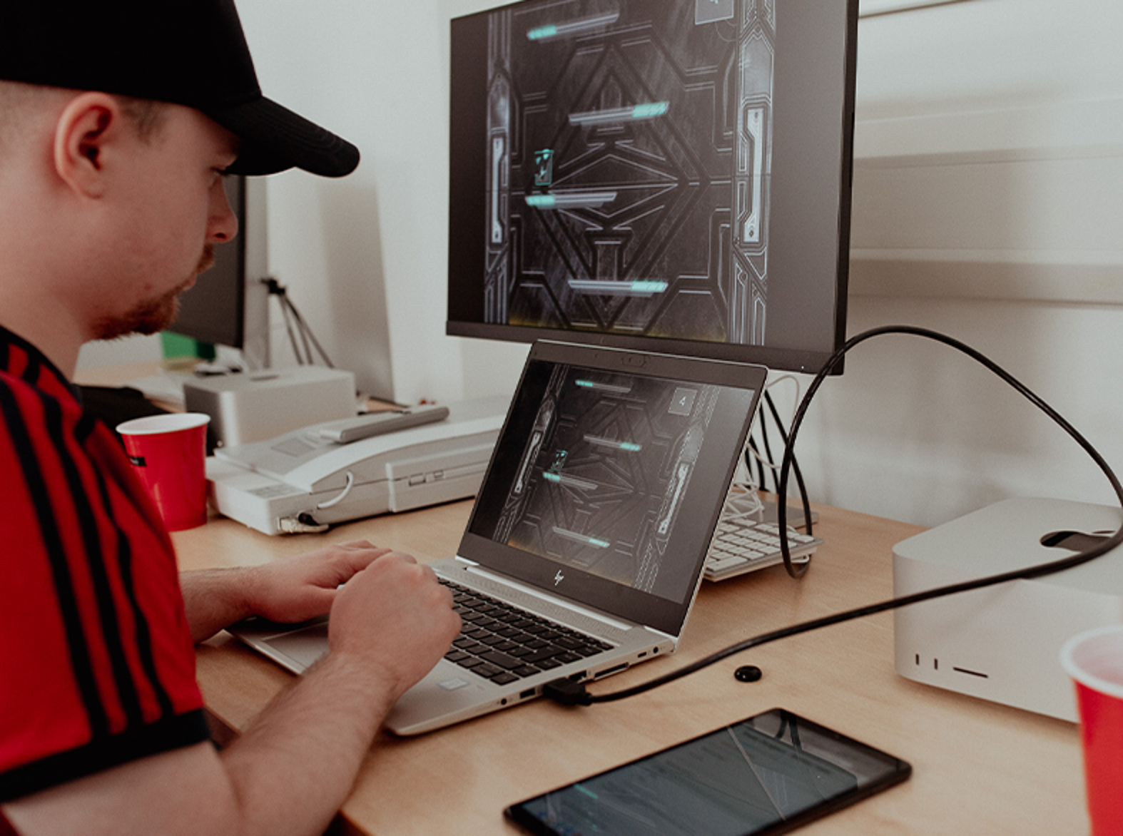 male digital student working on computer