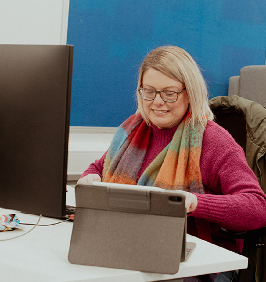 svq female student working on laptop