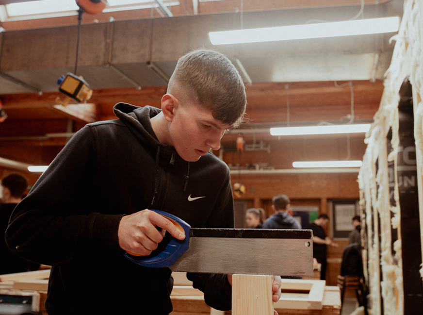 built environment student using equipment